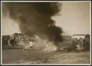 Burning wreckage of aeroplane with crowd watching AVIATION OLD PHOTO