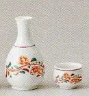 Sake set including a flower Maneki Tokkuri (sake flask) and cup, a From Japan