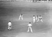 Australian Services' Bob Cristofani mistimes his shot inciting En- Old Photo