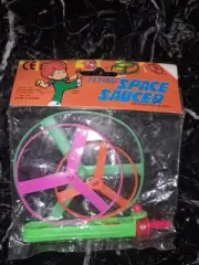 Vintage Flying Space Saucer Pull String Toy Header Bag