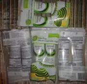 8 new bottles of wilton green & black striped icing 4.25oz each 34oz total + tip