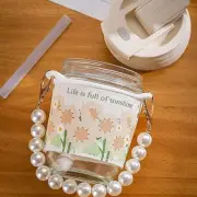 Beautiful looking water bottle with a handmade pearl string and a double silicon