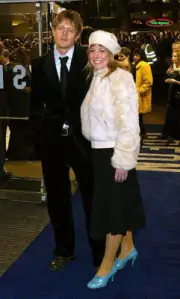 Kris Marshall and his partner Harriette Quarrie arrive at the UK - 2004 Photo
