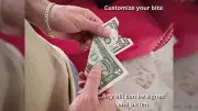 Tumi Magic presents PERFECT BITE (USD) by Erick White money magic tricks