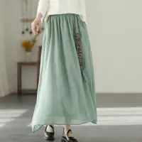 在飛比找ETMall東森購物網優惠-復古中國風掛牌刺繡麻料長裙盤扣