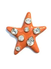 KENNETH JAY LANE, ORANGE ENAMEL BROOCH STAR PIN WITH MULTI SHAPE CLEAR CRYSTA...