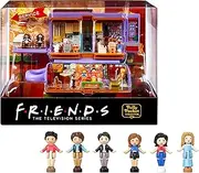 POLLY POCKET Friends Casket - Central Perk Coffee Mug, 6 Main Actors, 9 Accessories, 3 Friends Places, Premium Displayable Packaging, for Collectors Aged 14 Years and Above, HKV74
