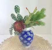 Decorative Planter with Cactus and Green Grass Succulents in a Blue and White Va
