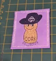 Cork Collector Girl Guide Patch Badge. Purple