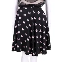 在飛比找Yahoo奇摩購物中心優惠-ANNA RACHELE 黑色蝴蝶結圖案及膝裙