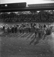 Cliff Griffith's car is pushed from the track after his qualify 1950 Indy Photo