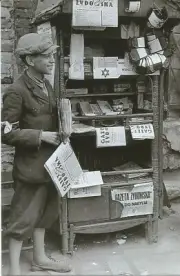 WW II GermanPhoto -- Boy Selling In Jewish Ghetto
