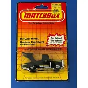 Vintage MATCHBOX SUPERFAST #65 TYRONE MALONE BANDAG BANDIT MINT CARDED