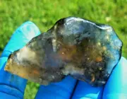 Libyan Desert Glass Meteorite Tektite impact specimen( 265 ct)Dimples Dark Green