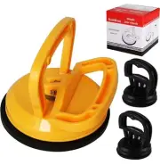 Dent puller with yellow suction cup to repair dents in glass, tiles, mirrors….