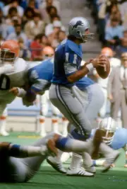 Quarterback Greg Landry Detroit Lions drops back to pass v the Ci- 1974 Photo 2