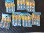 Vintage unopened package of 63 Miniature sitting Babies Toy Dollhouse FAMUS