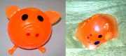Splat ORANGE PIG Toy! splats then morphs back! throw on a smooth clean surface