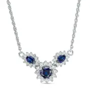 Oval and Round Lab-Created Blue and White Sapphire Sunburst Frame Three Stone Necklace in Sterling Silver