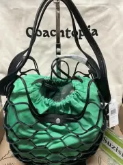 Coach Basket Bag In Regenerative Leather CV900 COLOR: Electric Kelp/Black