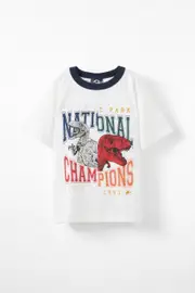 [Cotton On Kids] Cotton On Kids - Jurassic Park Drop Shoulder Short Sleeve Tee - Lcn uni vanilla/jurassic park class 5 LCN UNI VANILLA/JURASSIC PARK CLASS