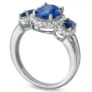 Oval Lab-Created Blue Sapphire and White Sapphire Three Stone Ring in Sterling Silver