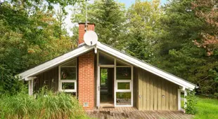 Wooden Holiday Home in Jutland with Sea nearby