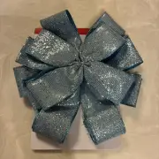 Celebrate it Christmas tree topper bow Light blue with glitter