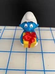smurfs with yellow present