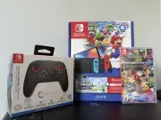 Nintendo Switch OLED Model + Super Mario Bros. Wonder Bundle + Mario Cart