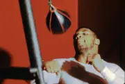Mike Tyson punches the speed bag during a workout in Atlantic City- Old Photo