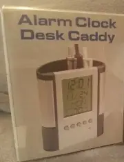 Alarm Clock/Desk Caddy. Digital display month, date, day and temperature.