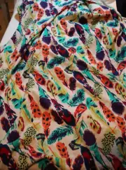 colorful Feathers on White Cotton Spandex Knit Fabric Feathers on off white