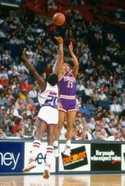 Kevin Johnson Phoenix Suns shoots over Steve Colter Washin Basketball 1988 Photo