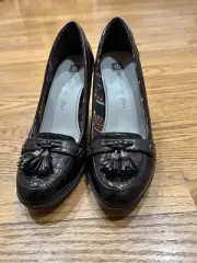 Anne Klein iFLEX Thornton Women’s Tasseled Faux Patent Leather 3” High Heels. B