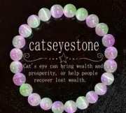 Pink and purple cat's eye bracelet symbolizing wealth and prosperity