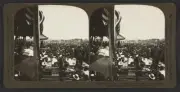The reviewing stands and crowds of spectators listening to Pres. Roos Old Photo