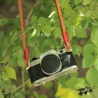 在飛比找Yahoo!奇摩拍賣優惠-zeku真皮相機背帶復古植鞣皮相機肩帶牛皮手工繞線微單單反背