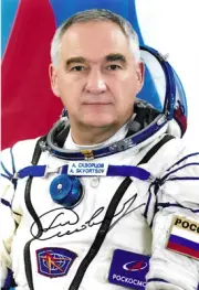 Cosmonaut Skvortsov Soyuz TMA 12M Exp. 39 Signed Photo 8" X 12" Sokol Spacesuit