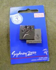 #D511. 2000 OLYMPIC SPORTS METAL BADGE ON CARD - RHYTHMIC GYMNASTICS
