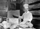 Mr Francois Latry, a chef at London's Savoy Hotel, with some haggis 1922 Photo