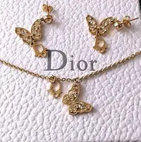 在飛比找Yahoo!奇摩拍賣優惠-Christian Dior克里斯汀·迪奧-超美金色蝴蝶簍空
