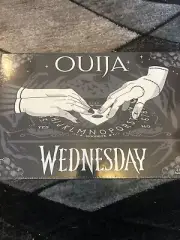 Ouija: Wednesday Edition Glow In The Dark Spirit Board USAOPOLY Addams.