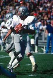 Quarterback Ken Stabler Oakland Raiders drops back to pass v the N- Old Photo