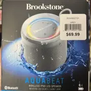Brookstone AquaBeat Wireless Bluetooth Speaker IPX6 Rotating LED Lights New