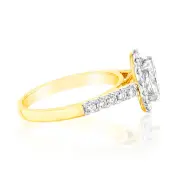 1.50 Carat Diamond Ring With 1 Carat Oval Centre Surrounded by 1/2 Carat Round Diamond Halo in 18ct Yellow Gold, M
