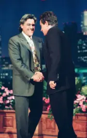 Host Jay Leno greets Actor Warren Beatty on October 18, 1994 Old TV Photo