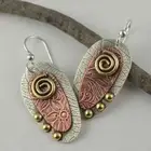 Piercing Drop Zinc Alloy Earrings Flower Pattern Engraving Oval Shape Pendant