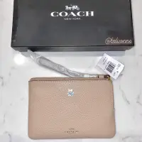 在飛比找蝦皮購物優惠-Coach - 小手拿包 客製燙印的銀色亮片狗掌 🐾 L-Z