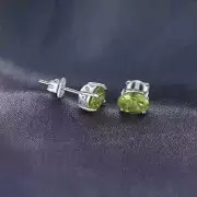 7x5mm Oval Cut Lab-Created Peridot Solitaire Stud Earrings 14K White Gold Plated